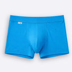 Blue boxer briefs on a light gray background