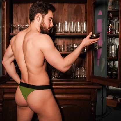 man in green thong